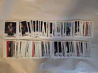 Two rows of approximately 90 Topps Formula 1 flagship base cards spread out