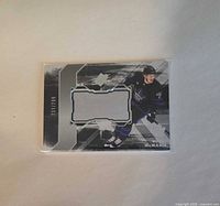 Front of 2023-24 Upper Deck SPx Finite Rookies Bobby McMann card showing player image, foil design and serial number 137/799