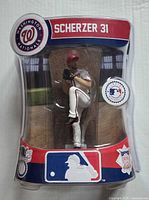 Front view of sealed Max Scherzer figure in packaging