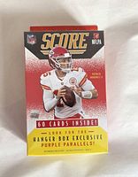 Front of sealed Panini Score 2021 NFL hanger box showing 60 cards inside notice and Patrick Mahomes II image