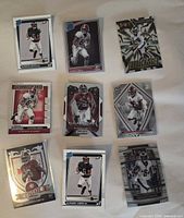 Front view of nine Devonta Smith rookie cards laid out in three rows on white background