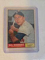 Front of 1961 Topps Gil Hodges #460 card in plastic sleeve