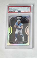 Front of PSA slabbed 2020 Panini Chronicles Prizm Black Silver Justin Herbert rookie card