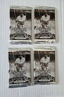 Front view of four sealed Babe Ruth Collection packs