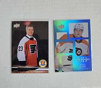 Fronts of both Matvei Michkov rookie cards: base #749 and UD Portraits #P47