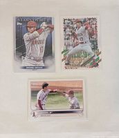 Fronts of three Shohei Ohtani Topps cards