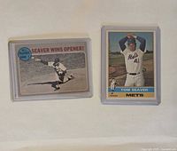 Fronts of both Tom Seaver cards in holders