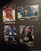 fronts of all four hockey cards
