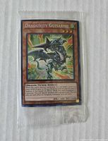 Front view of sealed Dragunity Guisarme card showing artwork and text