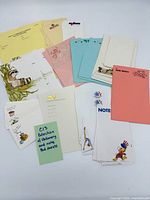 Overview of all stationery and notepad stacks on white background