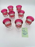 Eight cranberry flash King’s Crown goblets grouped top view