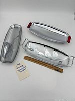 All three aluminum platters with ruler for scale