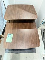 Top view showing two-tier design and wood grain surface