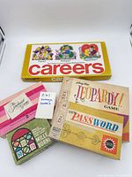 All five game boxes stacked and visible