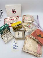 Group shot of all boxed and loose vintage napkins and coasters