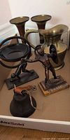 Overview of all brass decor items in lot