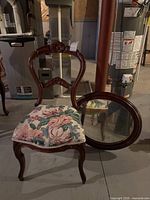Chair front with mirror leaning beside it