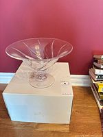 Full view of swirl glass bowl on pedestal