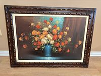 Full view of framed floral canvas artwork