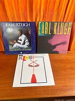 All three Earl Klugh albums front covers displayed on table
