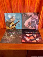 All four album covers front view