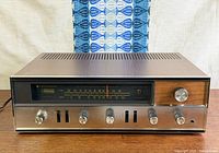 Front angled view of Kenwood TK-40 receiver showing wood cabinet and control layout