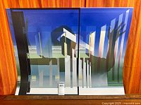 Full view of lithograph against backdrop showing overall composition and scale