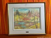 Full view of framed oil painting