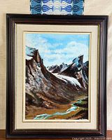 Full view of framed oil painting