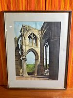 Full view of framed watercolour under glass