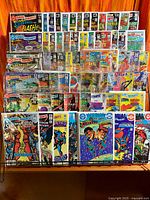Front view of full run of comics displayed on rack