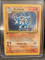 Front of Machamp holo card in top-loader