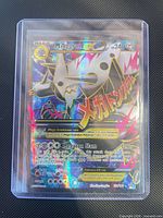 Front of M Aggron EX card in top-loader