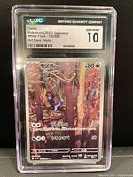 Front of CGC-encapsulated Deino card showing artwork and label