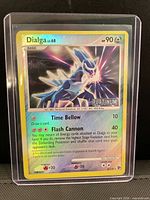 Front of Dialga holographic card in toploader