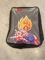 Full view of lunch bag front showing Goku graphic and overall condition