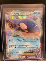 Front of Kyogre EX full art holographic card in toploader