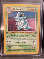 Front view of sleeved Nidoqueen holographic Jungle 1st Edition card