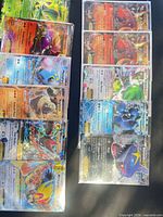 All 11 sleeved Pokémon EX/Mega EX cards laid out front view