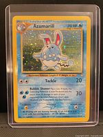 Front of Azumarill holographic card in sleeve