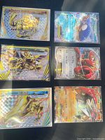 Grid of six sleeved Pokémon cards showing fronts