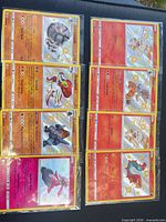 All eight sleeved shiny cards arranged 4x2