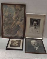 Group shot of four framed artworks