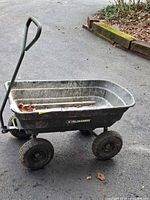 Full side view of Gorilla Carts wagon showing handle and wheels