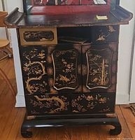 Front view showing painted panels, doors, drawers and overall form