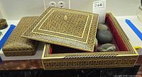 Open square inlaid box with lid, interior velvet, rectangular box, stones visible