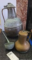 Jug, coffee pot and ladle grouped