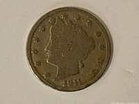 Obverse showing Liberty portrait and worn 1913 date