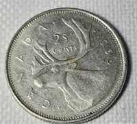 Reverse of 1968 Canadian 25-cent coin showing caribou and date