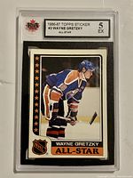 Front of encapsulated 1986-87 Topps Wayne Gretzky sticker showing grade label KSA 5 EX